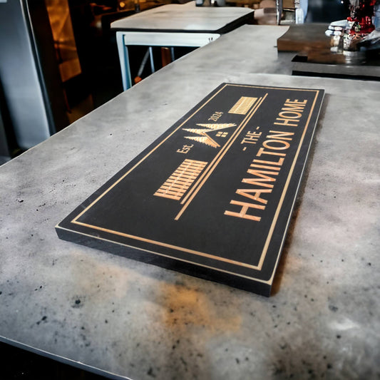 Home sign with a Picket Fence