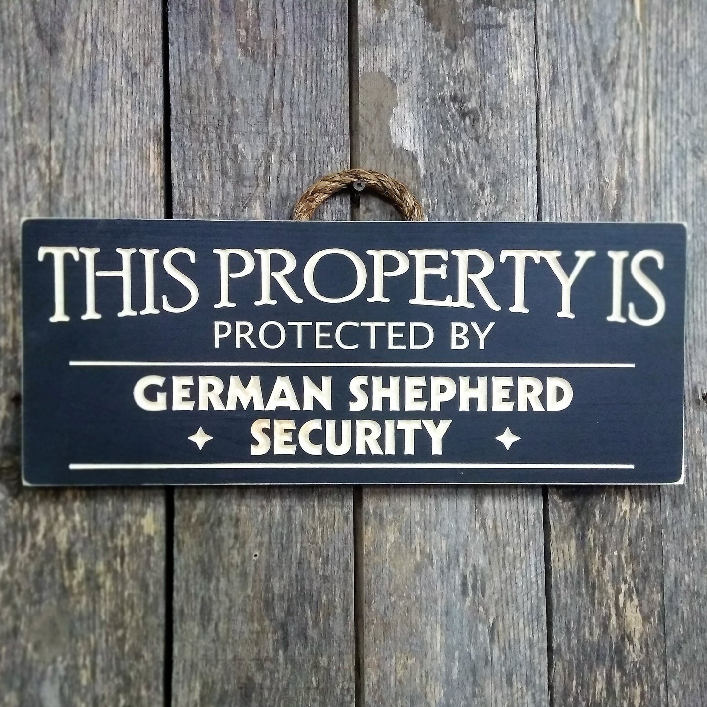 This property is protected by German shepherd, wood dog sign, personalize with your own dog breed