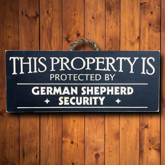 This property is protected by German shepherd, wood dog sign, personalize with your own dog breed