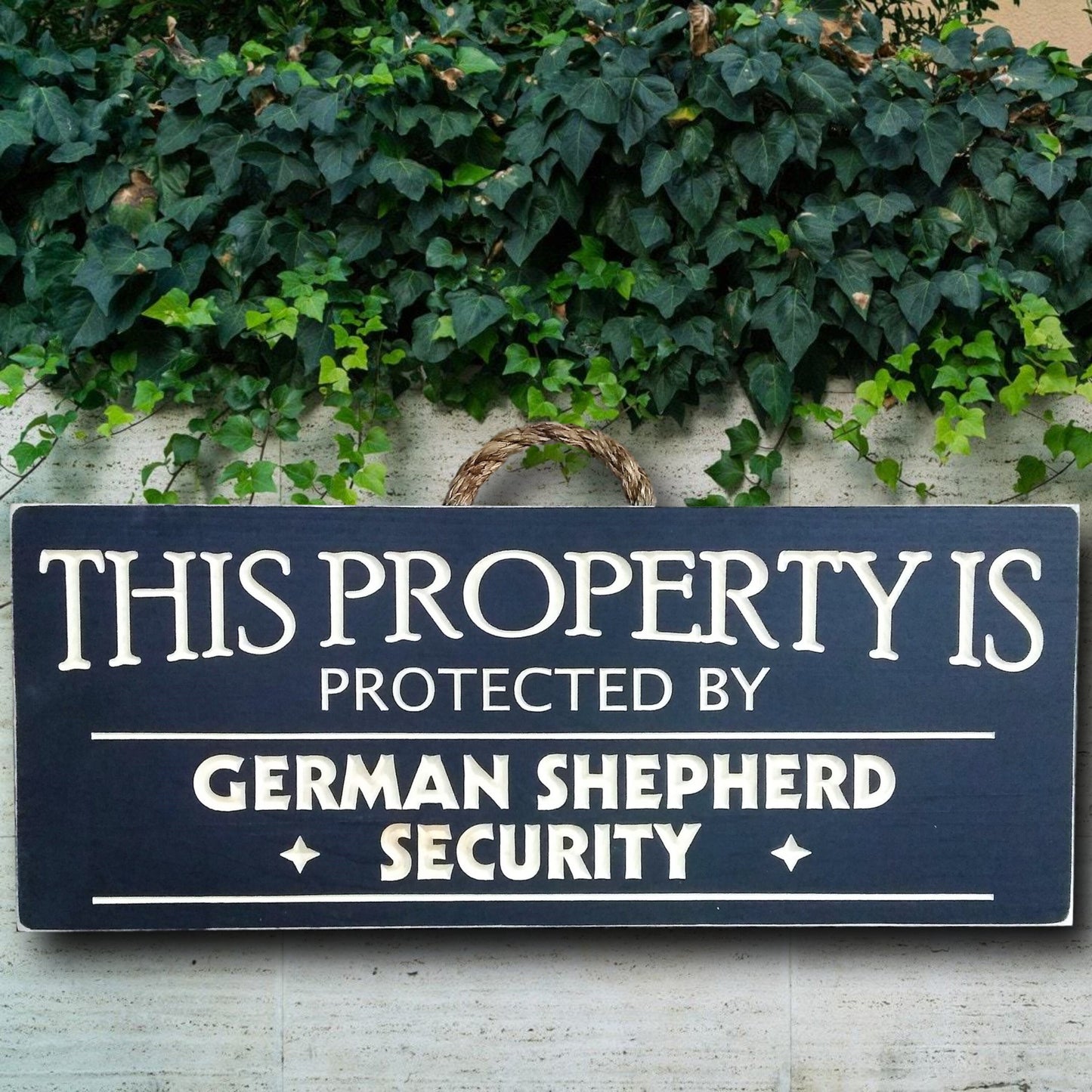 This property is protected by German shepherd, wood dog sign, personalize with your own dog breed