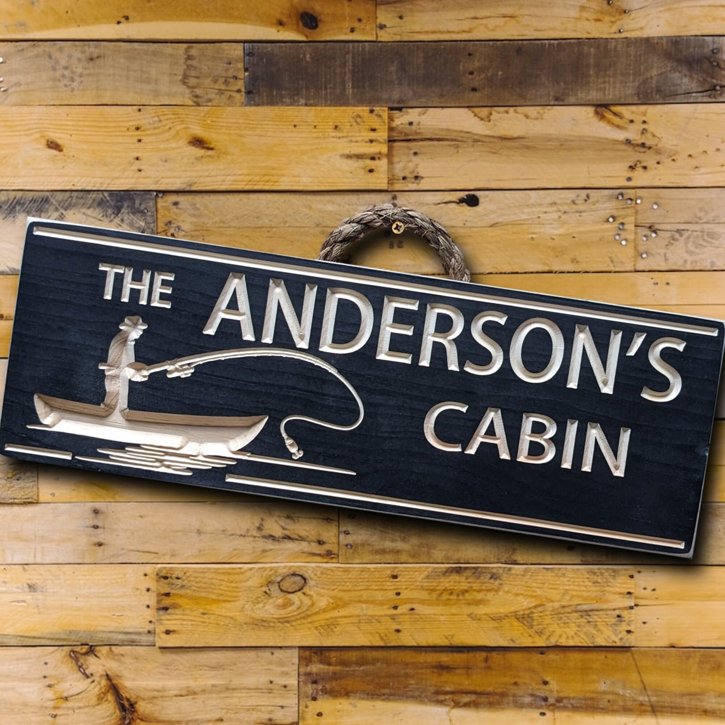 Cabin sign with a fisherman