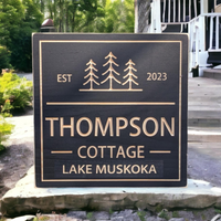 Square Cottage sign with trees