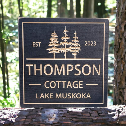 Square Cottage sign with trees