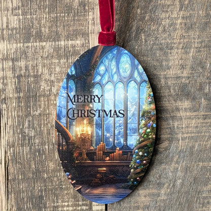 Decorative Christmas ornament with a festive scene and 'Merry Christmas' text on a wooden background.