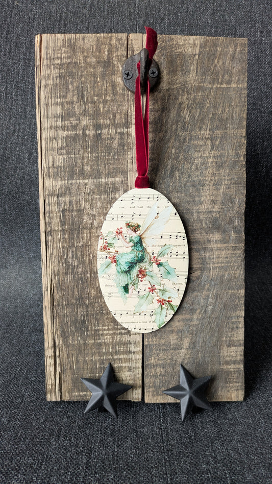 Decorative wooden plaque with a floral ornament and metal stars on a dark background