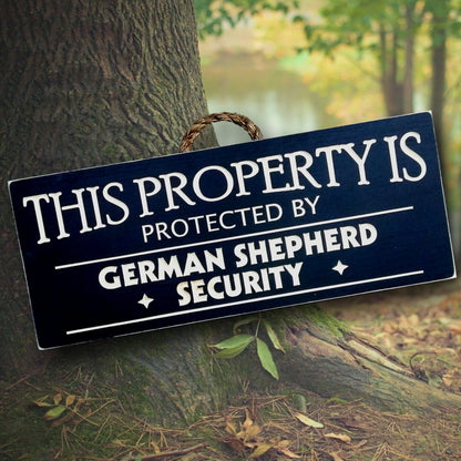 This property is protected by German shepherd, wood dog sign, personalize with your own dog breed